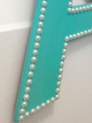 Adding Pearl Stickers to Wooden Letter Monogram