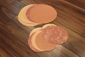 Orange scrapbook paper circles for paper pumpkin craft